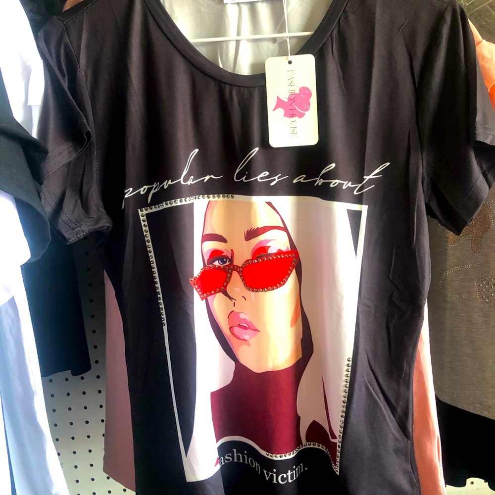 Black T-shirt. Size L. With small stones. Modern.